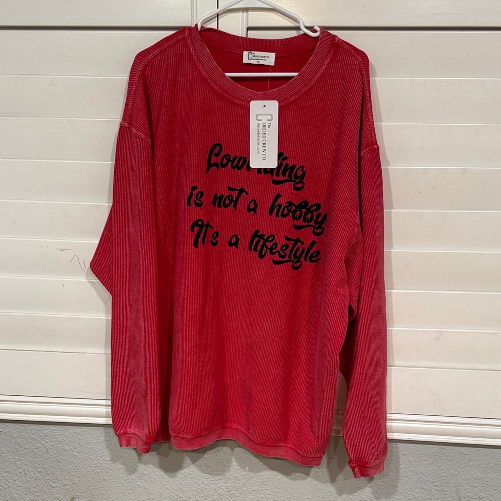 Red Sweater with Black Text